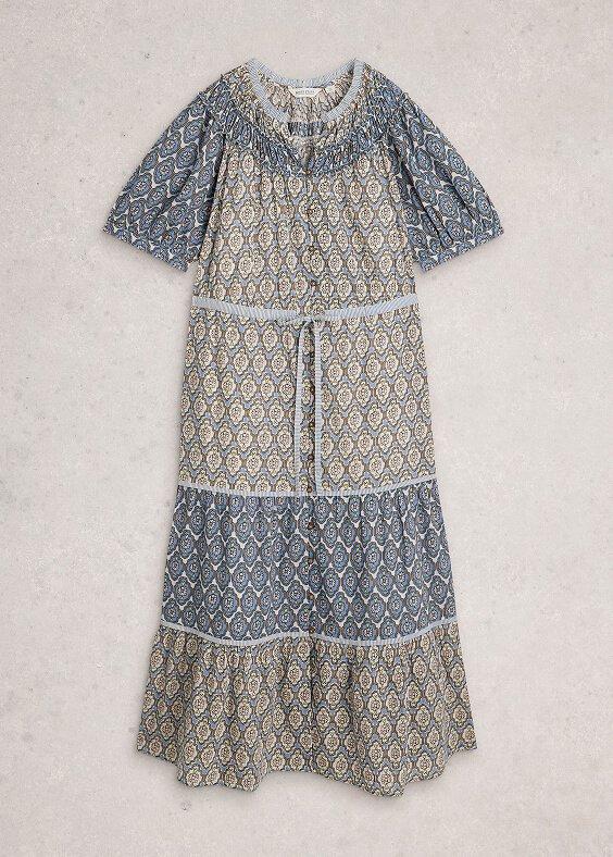a dress with a blue and white pattern on it