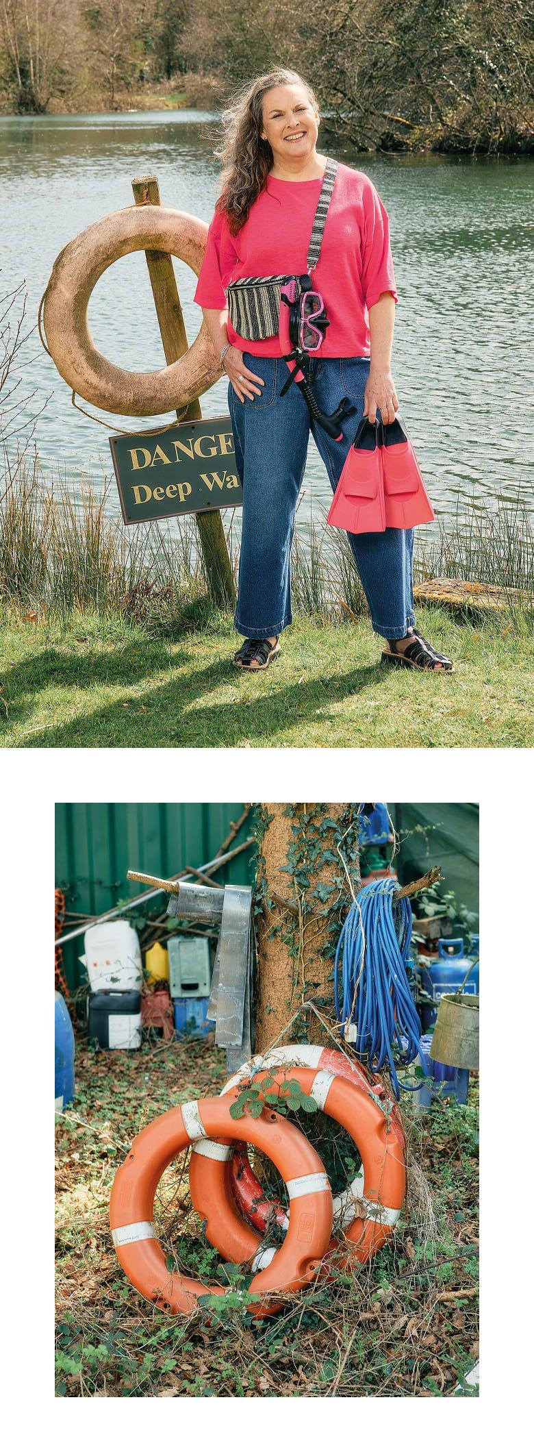 a woman standing next to a lake with life preservers