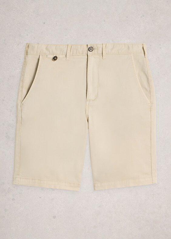 a pair of beige shorts with buttons on the side