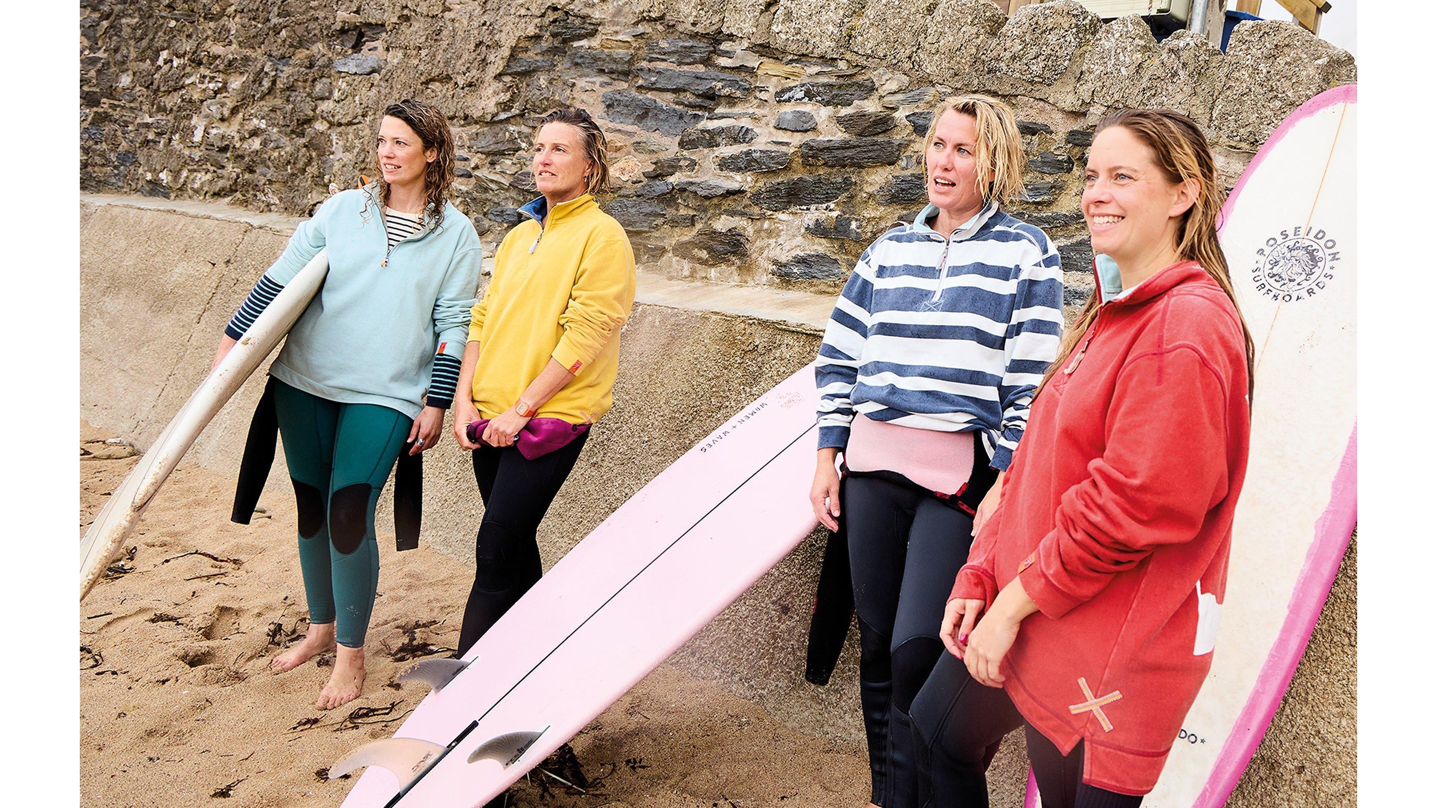 group with surfboard