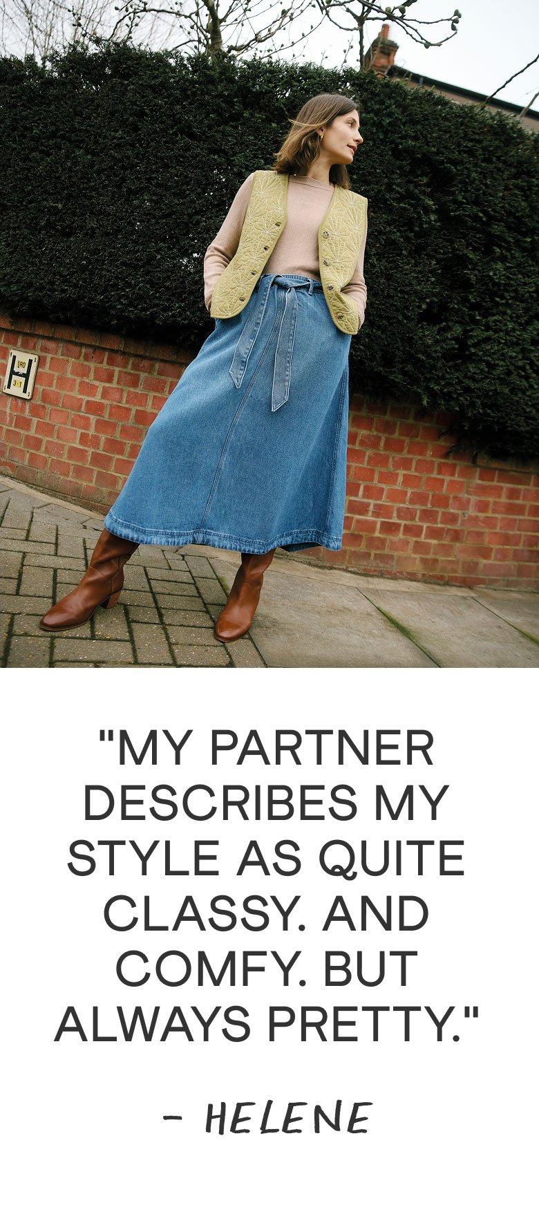 a woman is standing in front of a brick wall with a quote