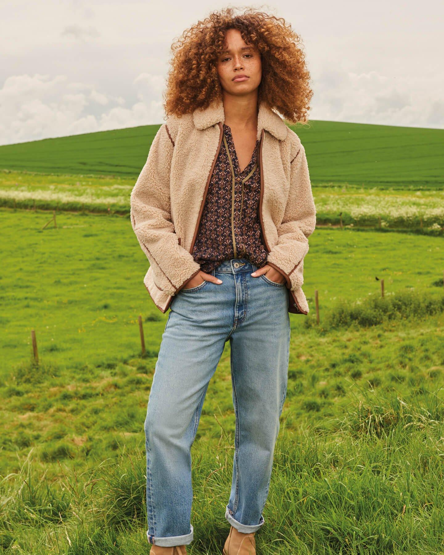 WOMAN IN JEANS AND JACKET