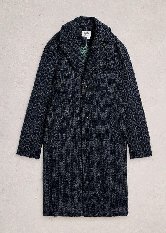 a coat in herringbone pattern
