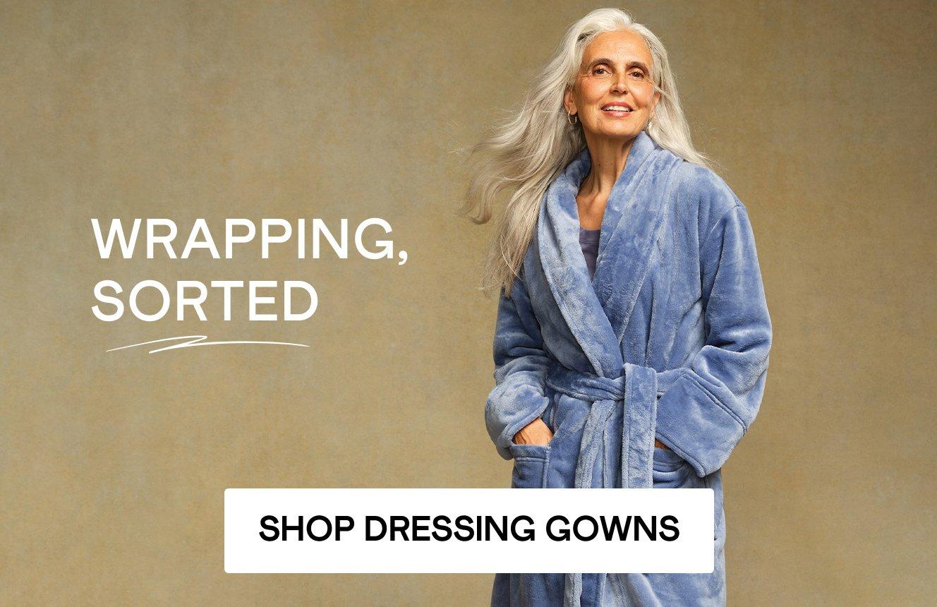 image of woman wearing a robe, click here to shop more.