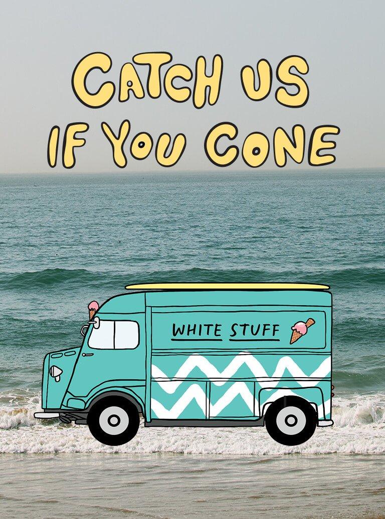 a woman in glasses standing outside a building