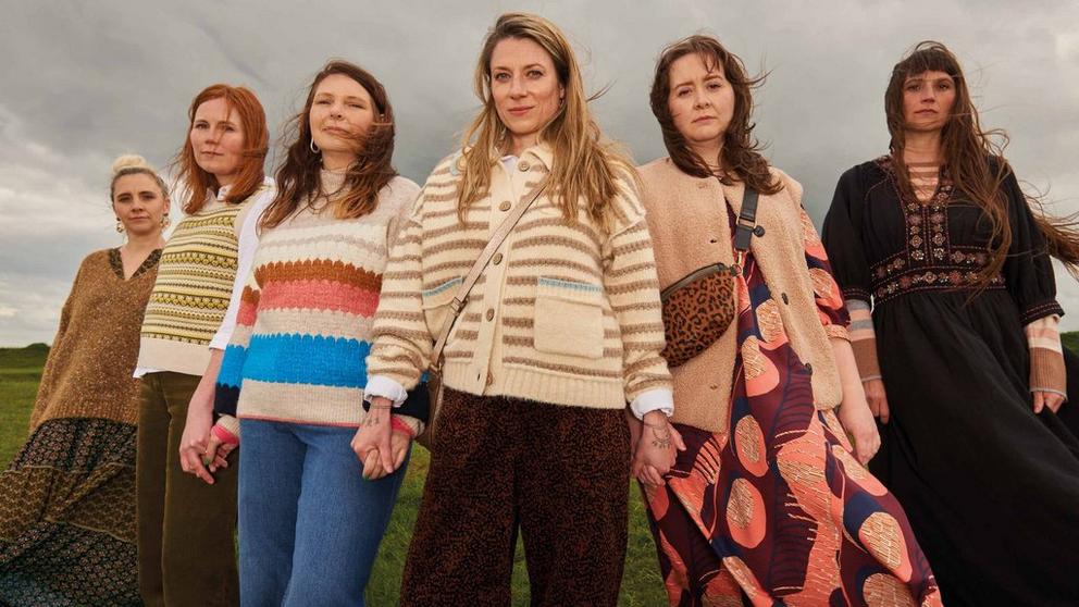 Group of women wearing White Stuff knitwear