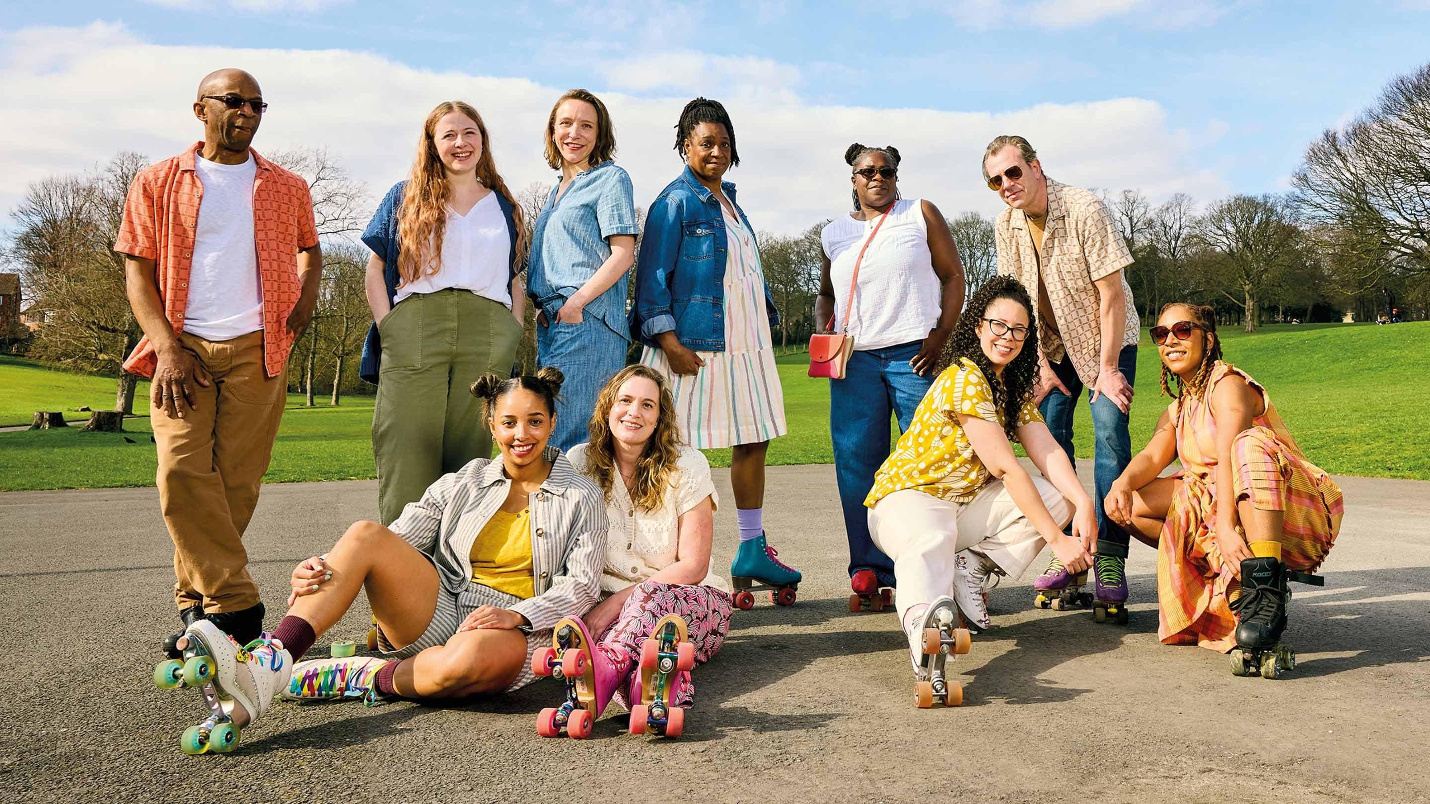 a group of people on roller skates posing for a picture
