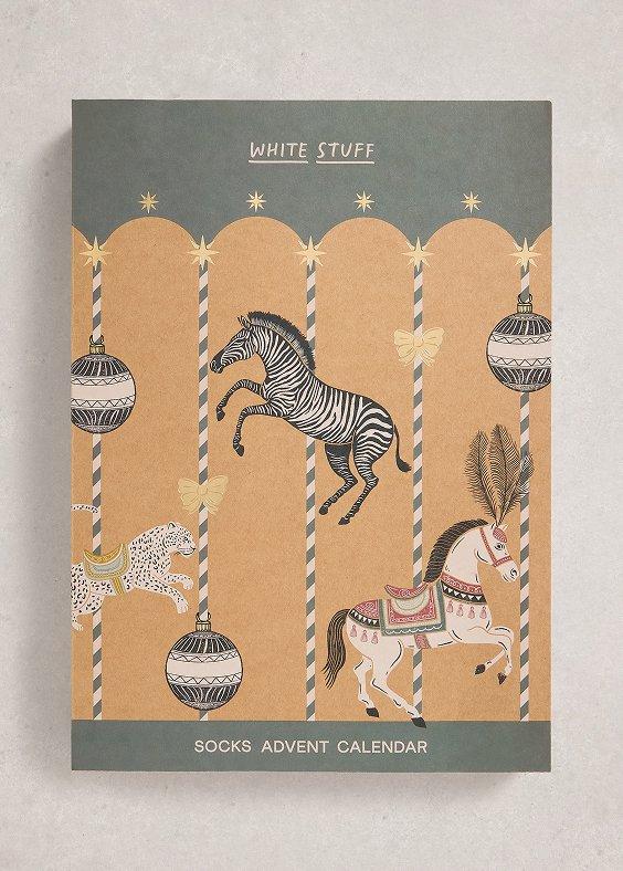 a box of socks with Christmas ornaments