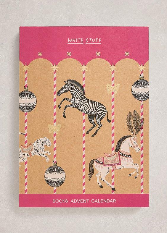 a box of socks with Christmas ornaments