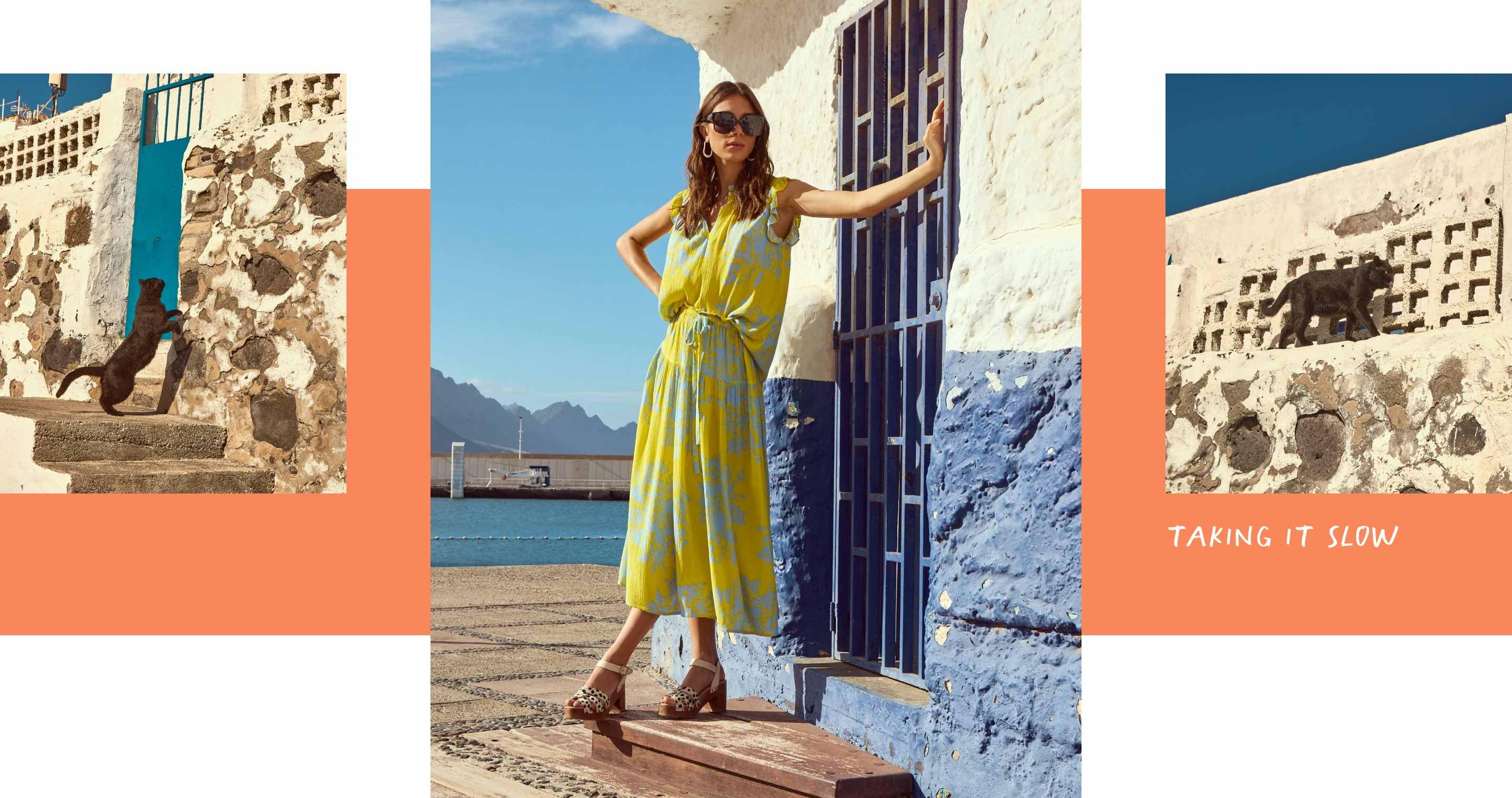 Woman in yellow printed linen summer dress
