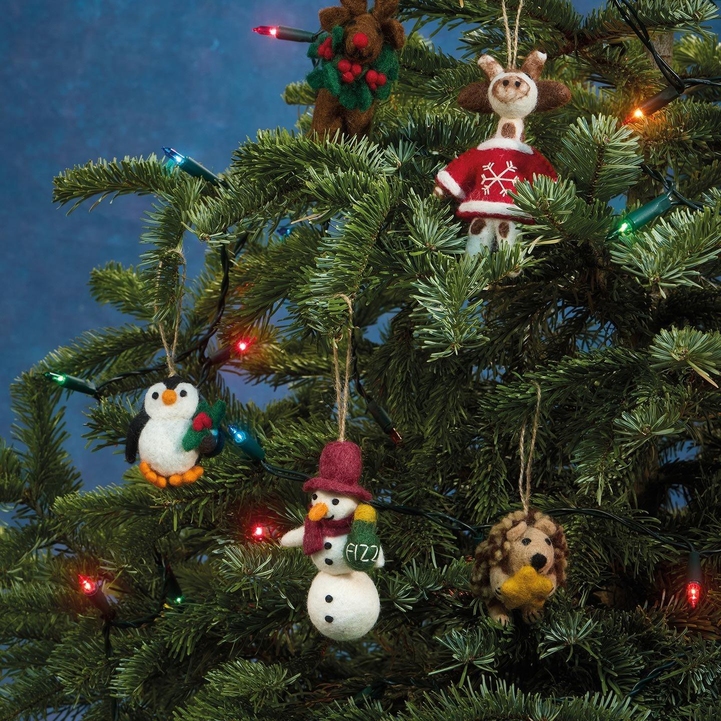 a christmas tree with ornaments hanging from it 