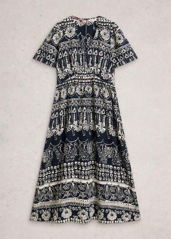 a dress with a blue and white pattern on it