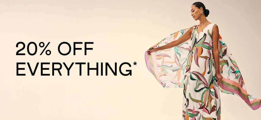 A woman on the right hand side wearing a long floral floaty maxi dress and on the left is some text which reads 20% OFF EVERYTHING*