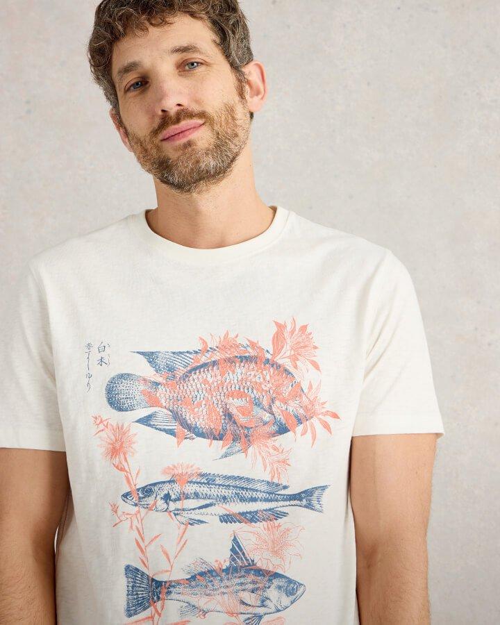 a male model wearing a white short sleeve t-shirt with printed fish design.