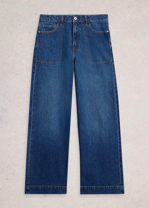 a pair of blue jeans with pockets on the side