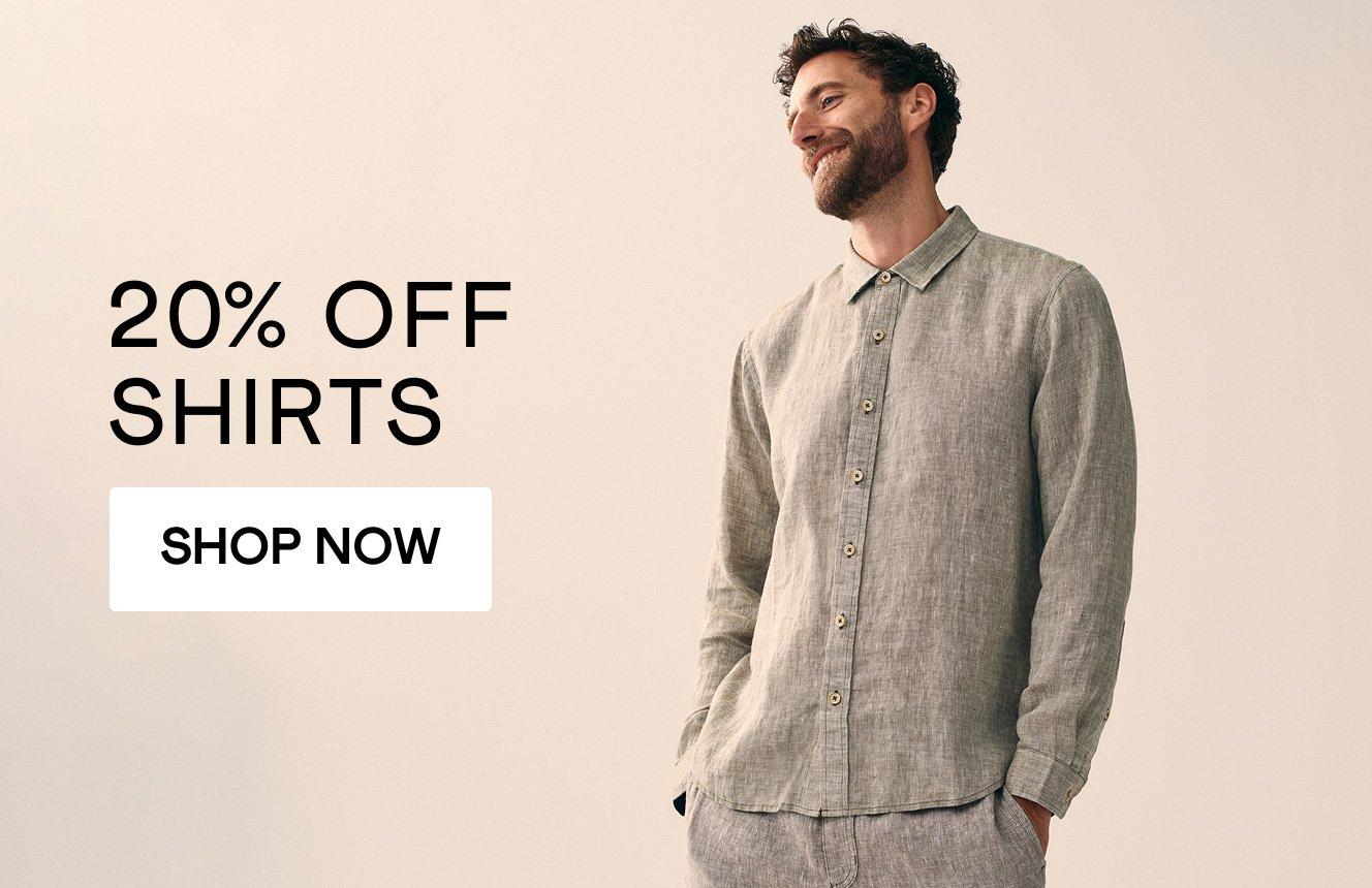 a man wearing a shirt with the text  20% off sshirts", click here to shop tees