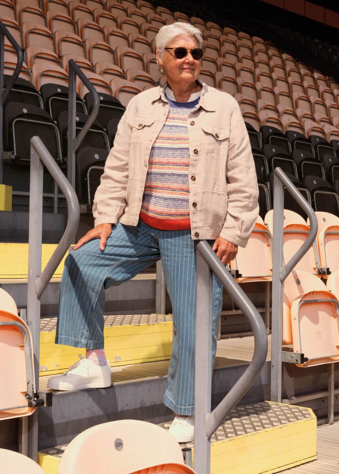 A Woman wearing the Tara Texture Tank, the Camille Linen Jacket and the Tia Striped Wide Leg Jeans