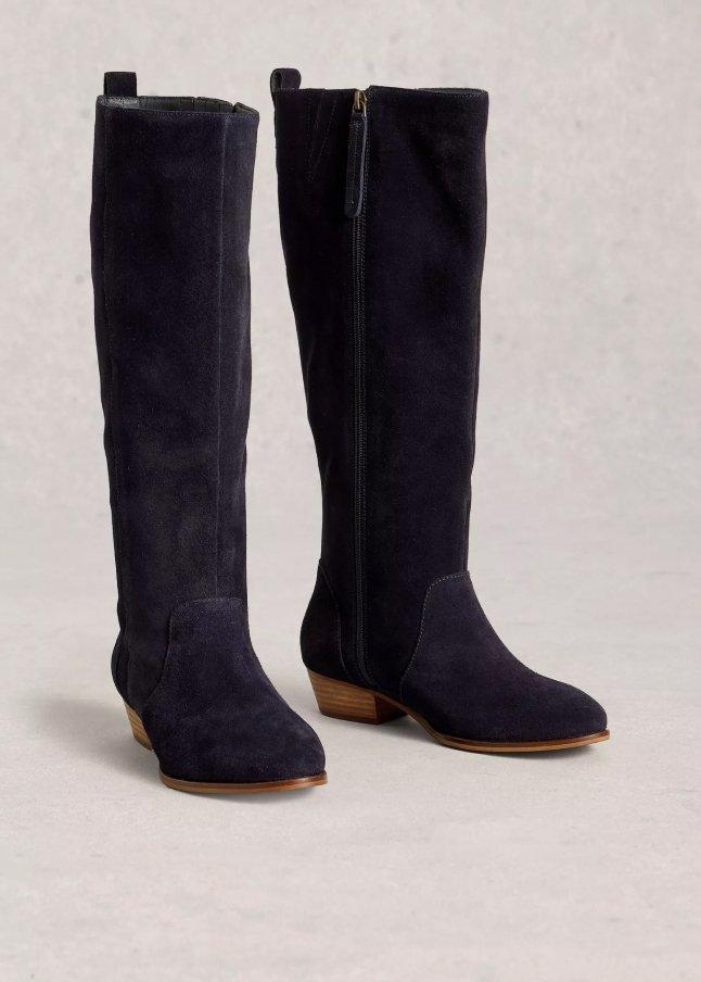 two pairs of tall boots with zippers on the side
