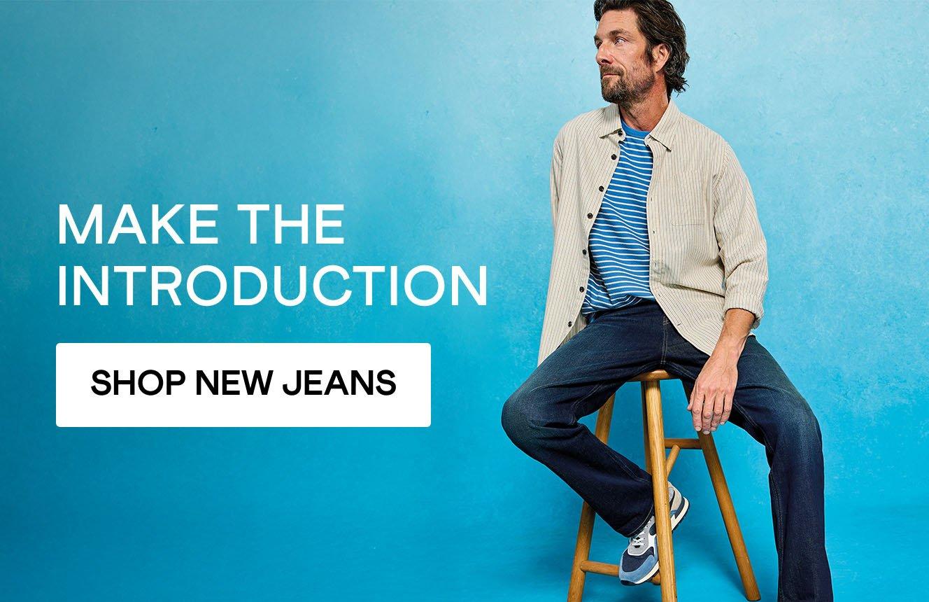 A man wearing jeans with the text "make the introduction", click here to shop jeans