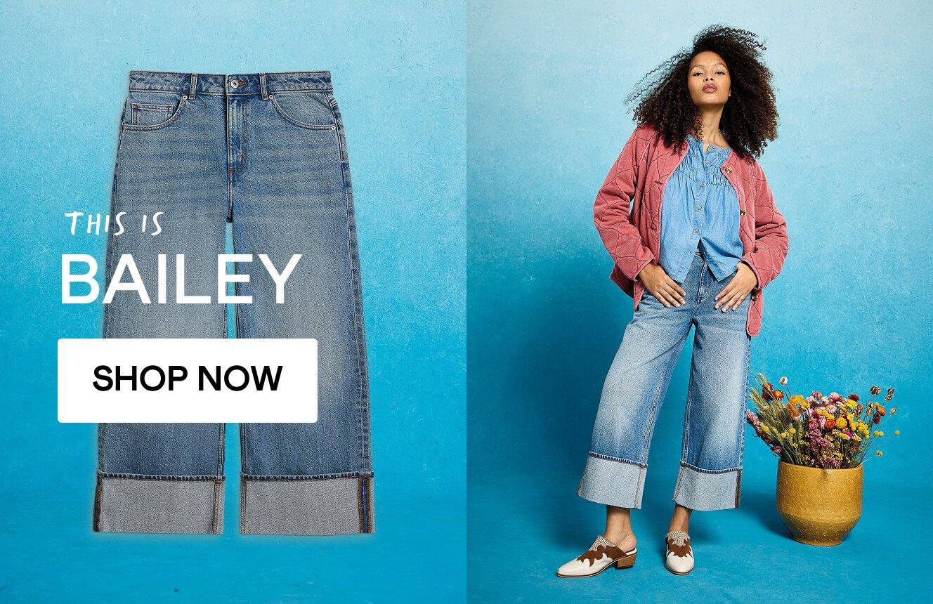 A woman wearing jeans, click here to shop the Bailey style.