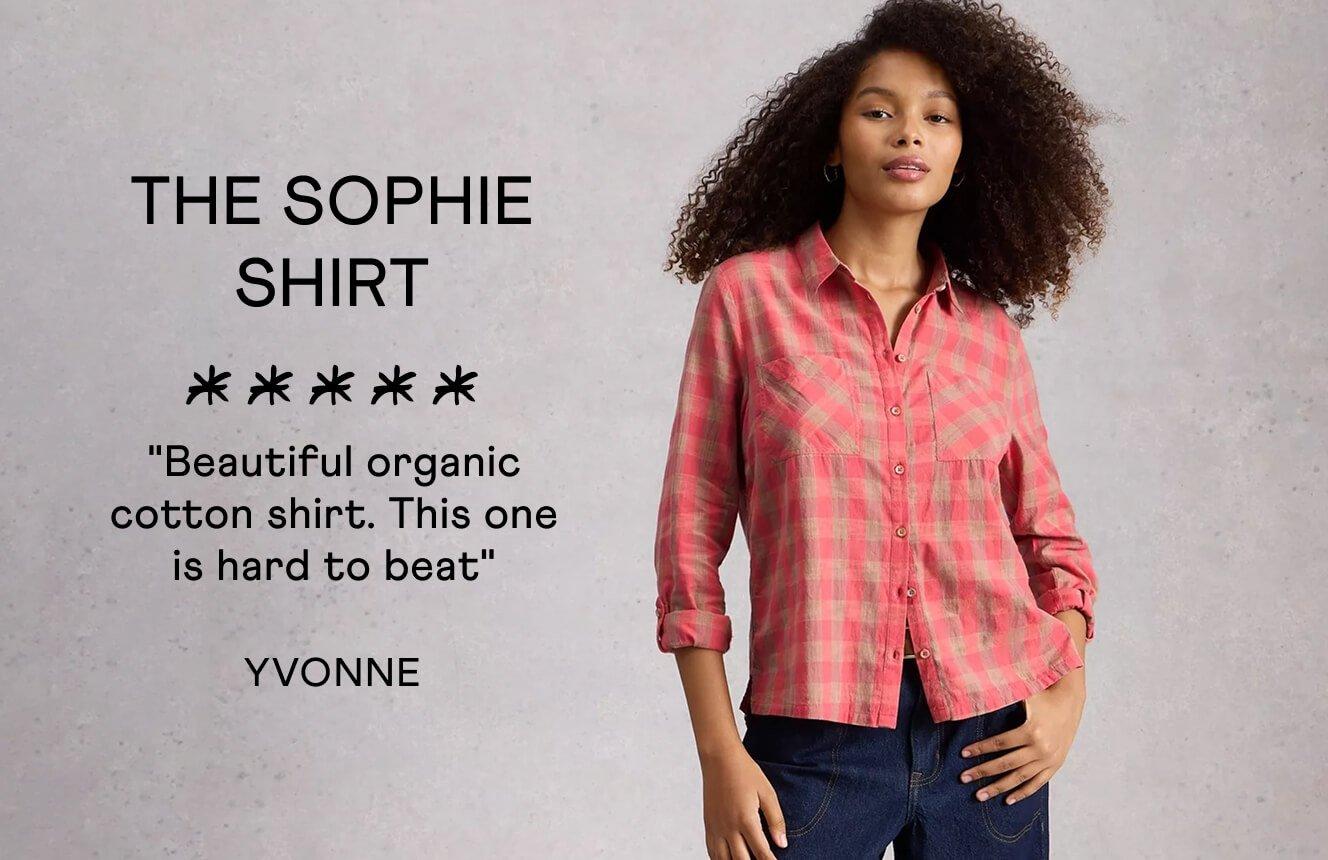 A woman wearing the Sophie Shirt. Text on Image is a 5 star review written by Yvonne: "Beautiful organic cotton shirt. This one is hard to beat".