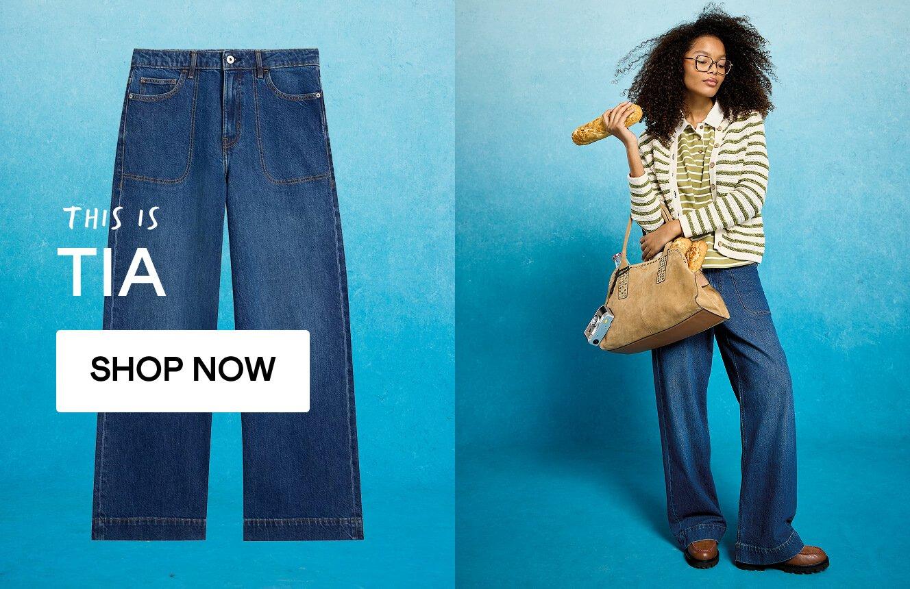 A woman wearing jeans, click here to shop the Tia style.