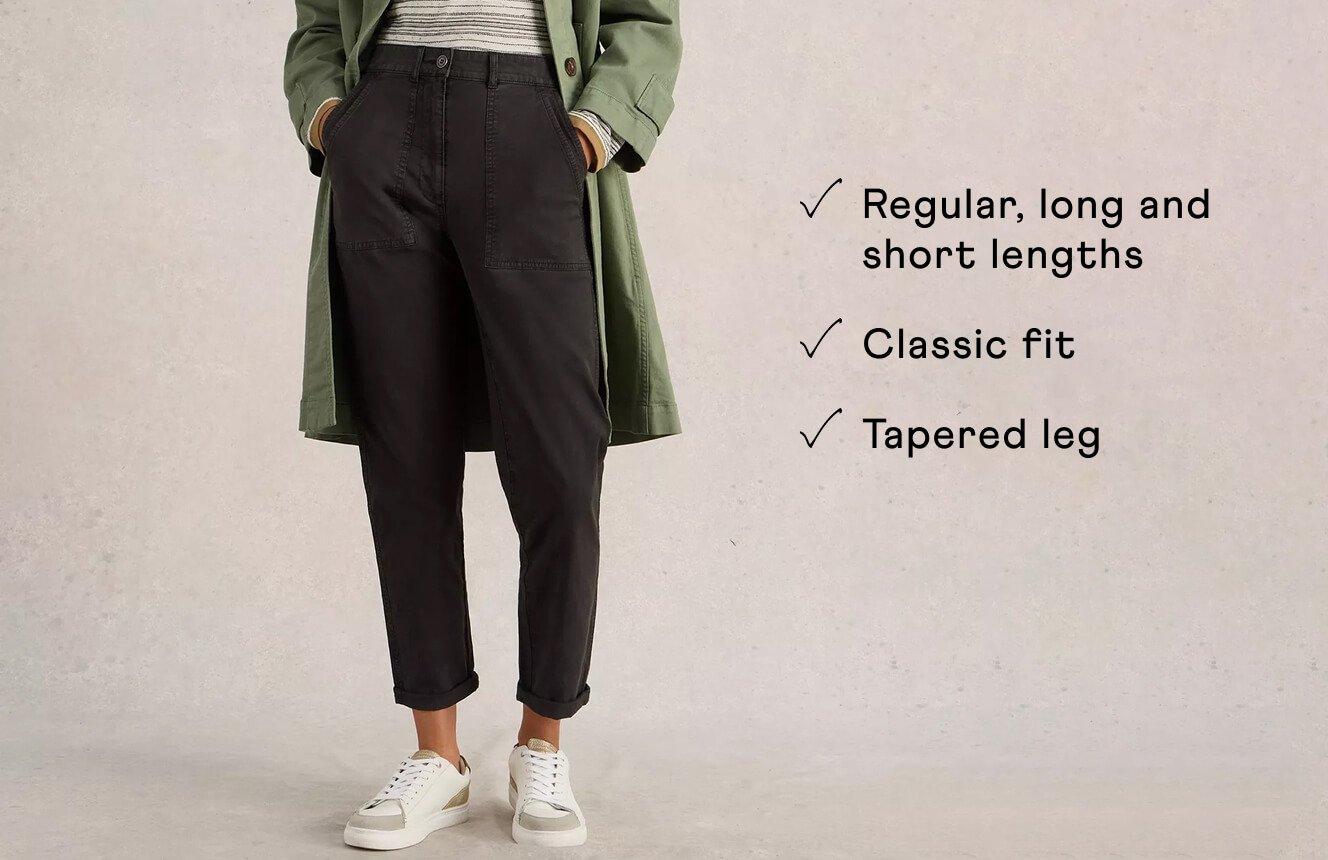 A woman wearing the Twister Chinos. Text on Image is "Regular, long andd short lengths, classic fit, tapered leg".