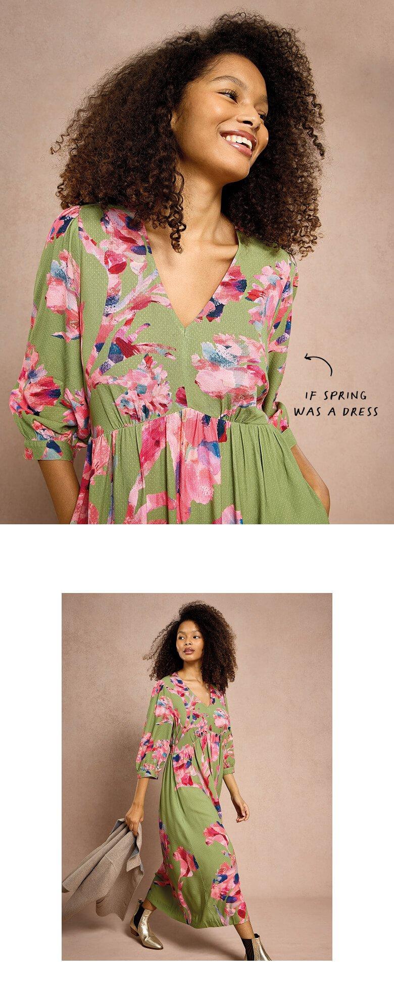 a woman in a green and pink floral dress 