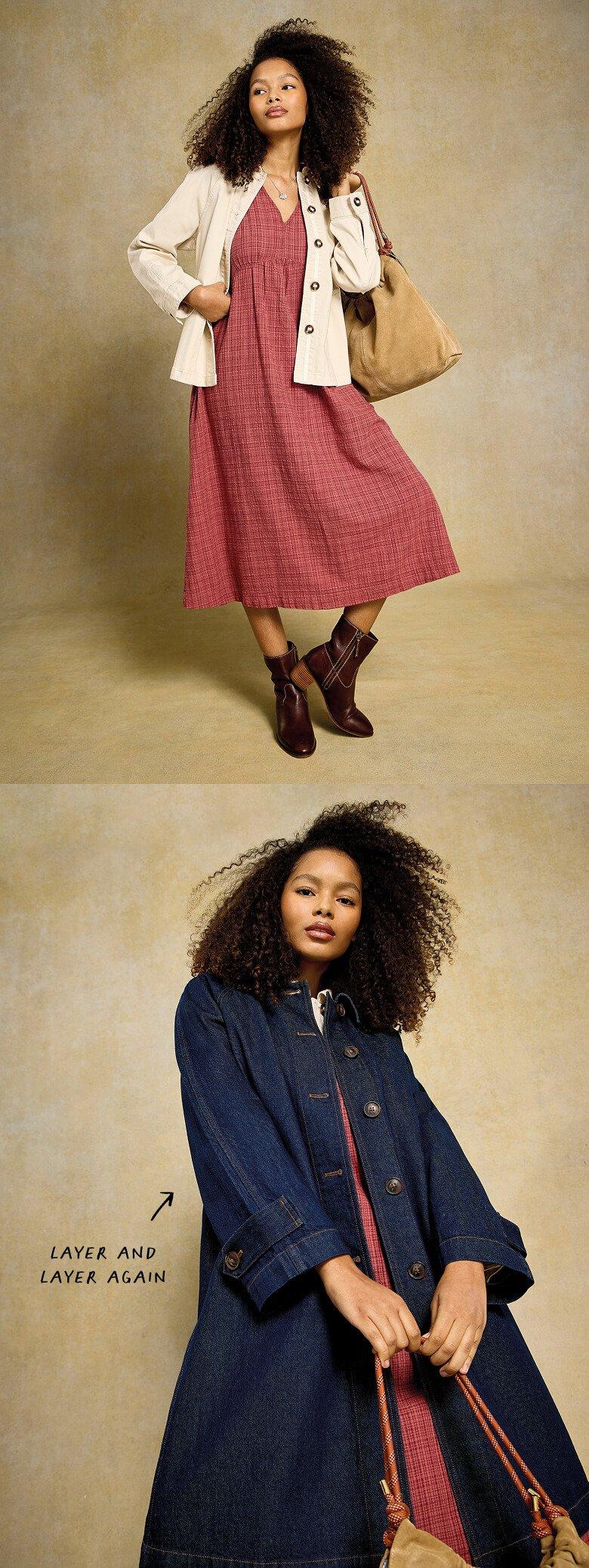 a woman in a dress and jacket is posing for a photo