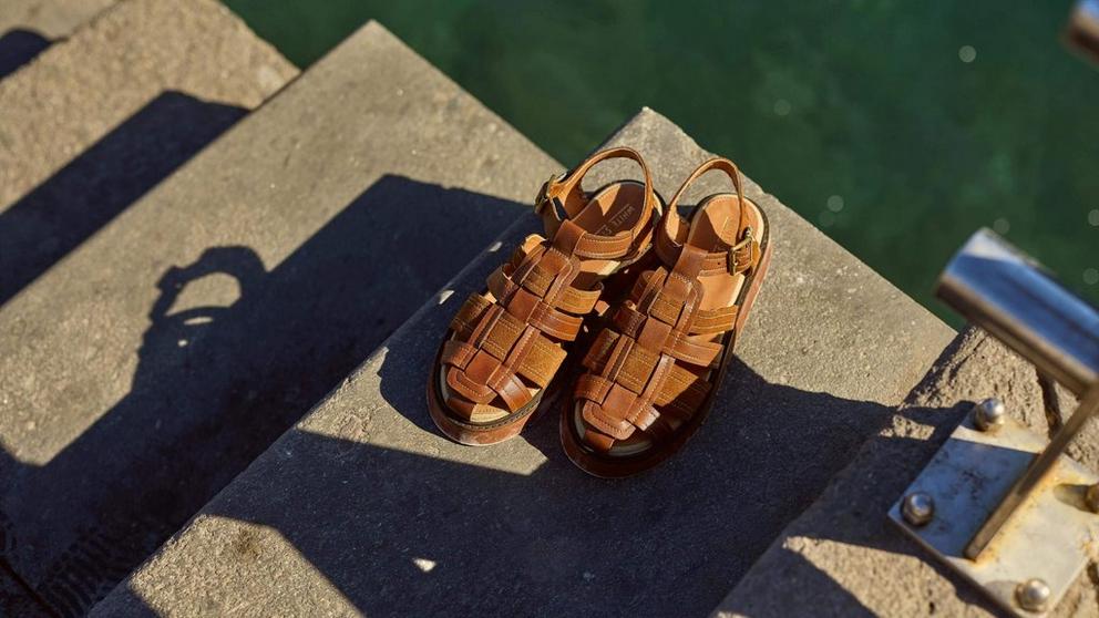 a pair of a pair of shoes sitting on a set of steps
