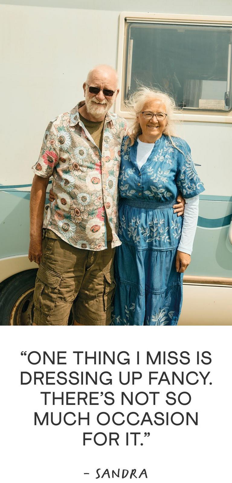 couple posing in front of van