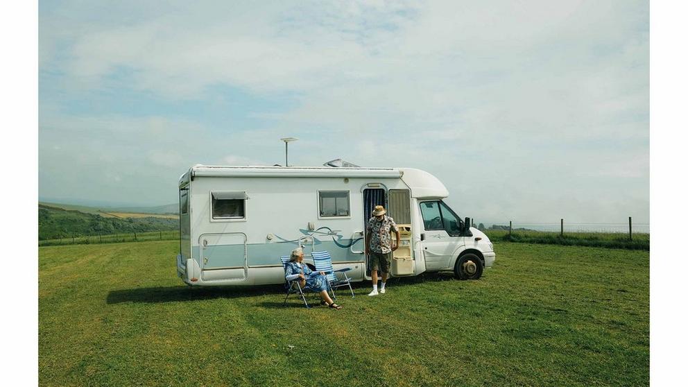 couple in front of their van