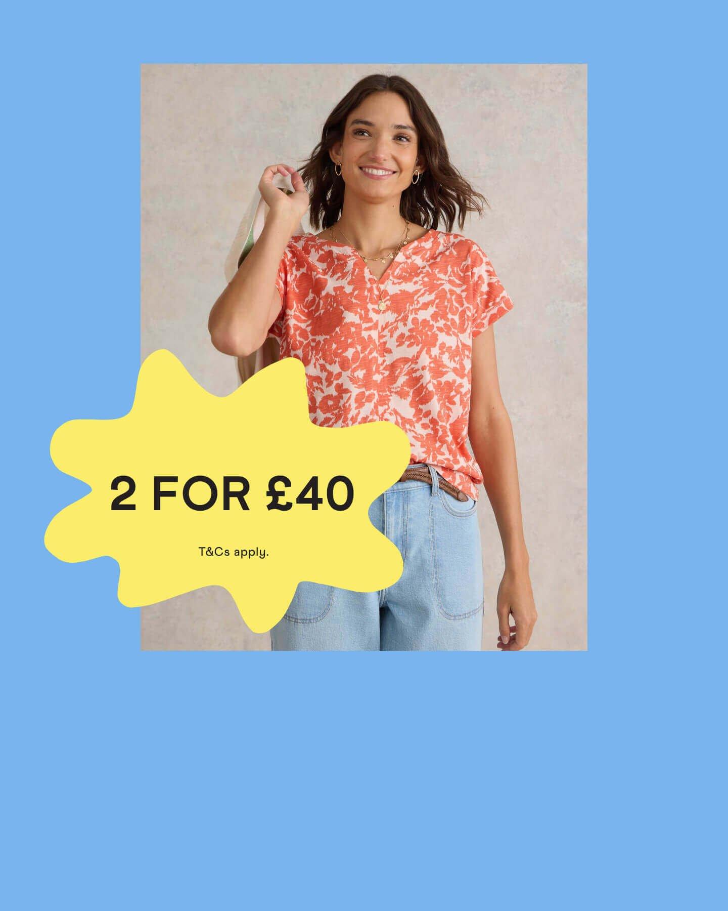 Woman in a orange and white t-shirt with a '2 for £40' promotional banner